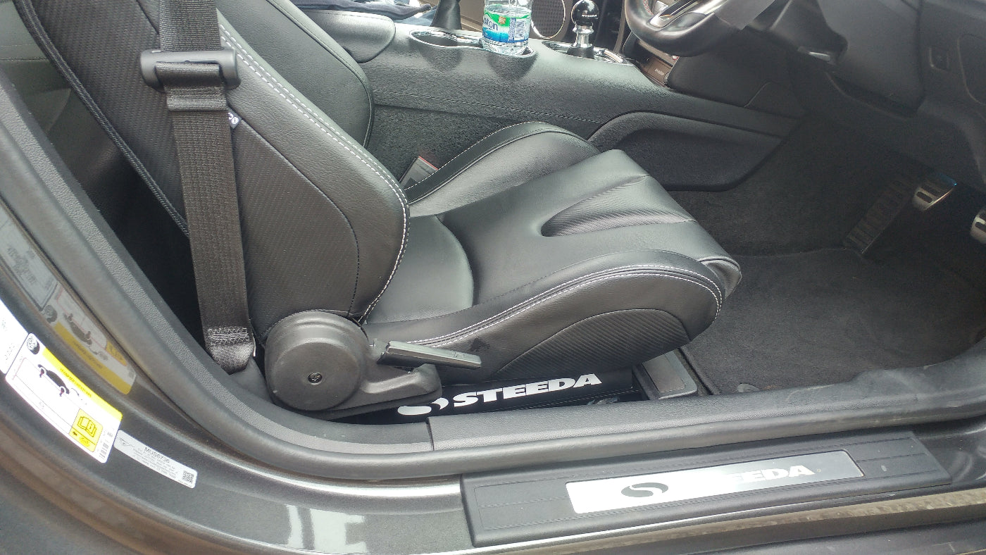Steeda Corbeau Bucket seats installed in Mustang with Custom mustang rails