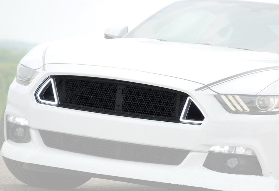 A white Mustang car with the CDC S550 Mustang Outlaw LED Switchback Upper Grille installed. The grille is designed to fit 2015-2017 S550 Mustang models.